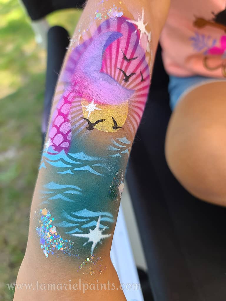 Airbrush design with a colorful ocean scene