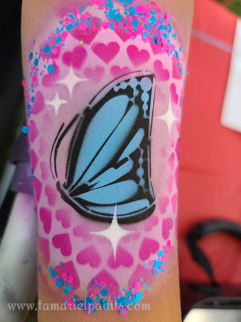 Airbrush design with butterfly design