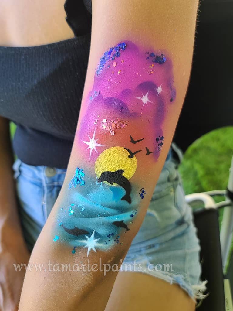 Airbrush design with dolphin ocean theme