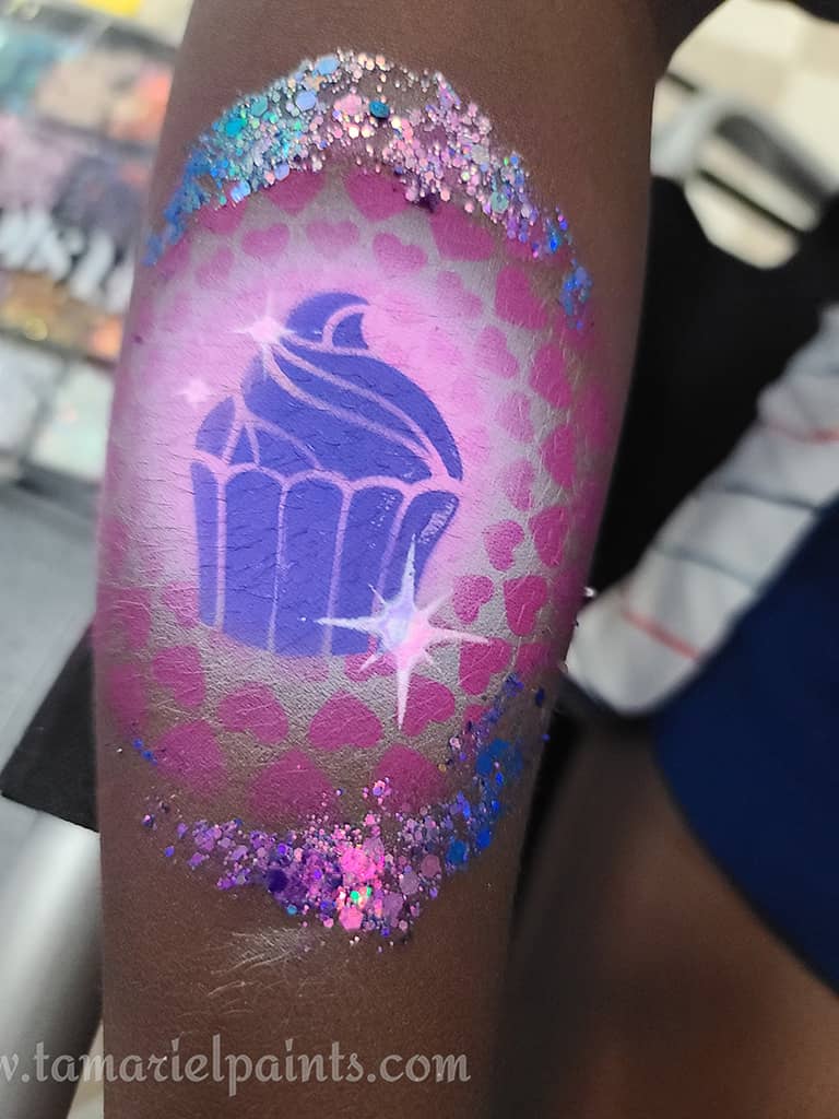 Airbrush design with a purple cupcake