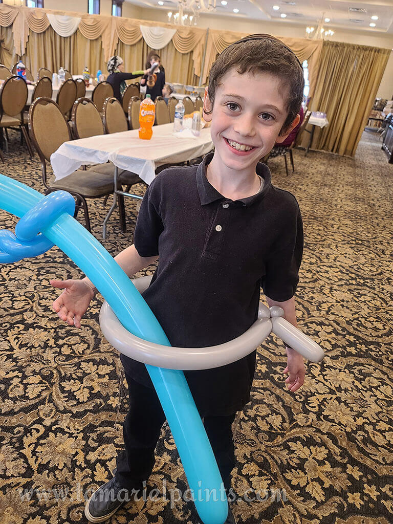 Tables with colorful balloon decorations