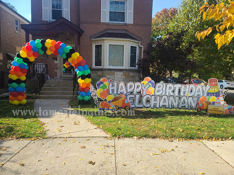 A photo of a balloon display with colorful balloons in an arch