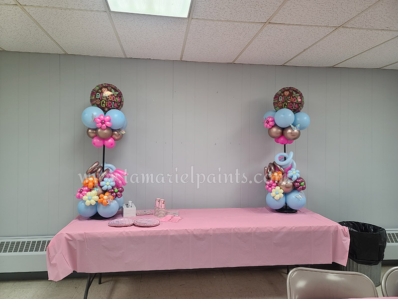 A photo of a balloon art displays on a table 