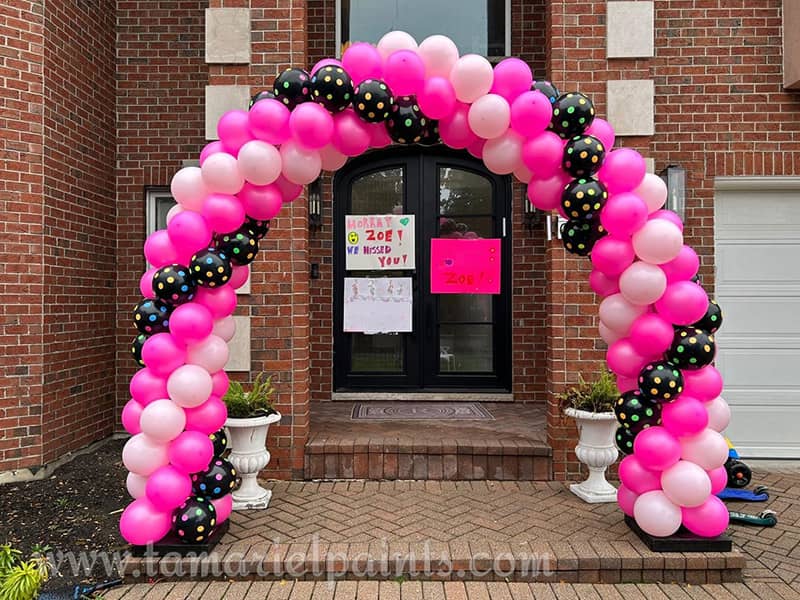 A photo example of a colorful, custom balloon display