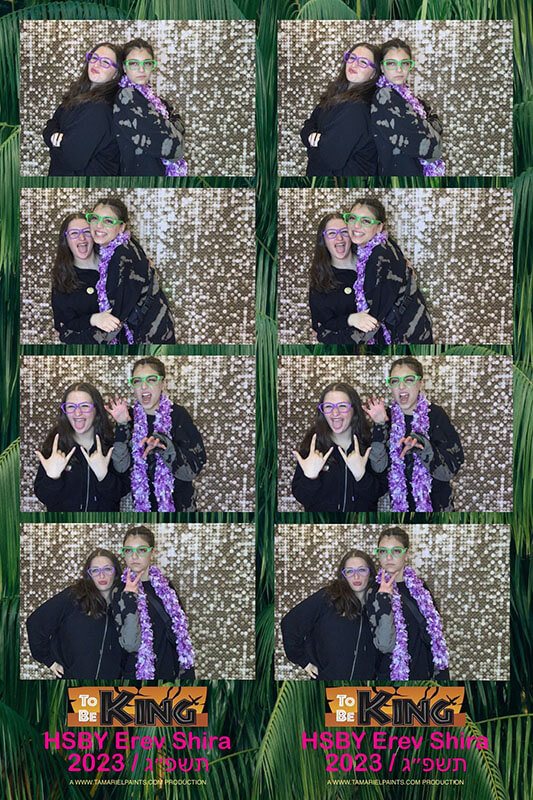 An example of kids having fun with a photo booth at a party