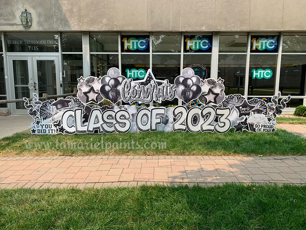 A photo of a custom made yard sign which reads Class of 2023