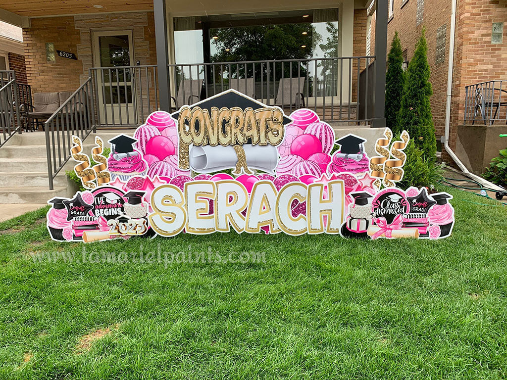 A photo of a custom made yard sign which reads Congrats Serach