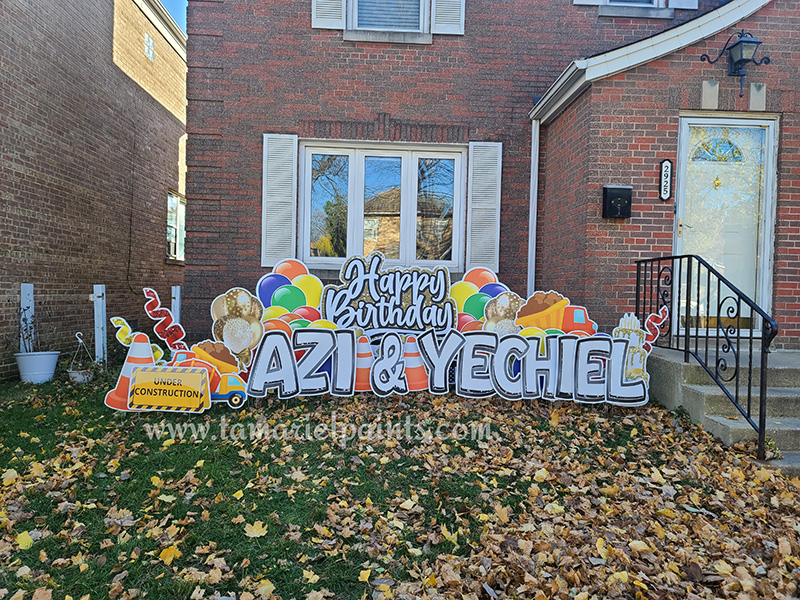 A photo of a custom made yard sign which reads Happy Birthday Azi and Yechiel