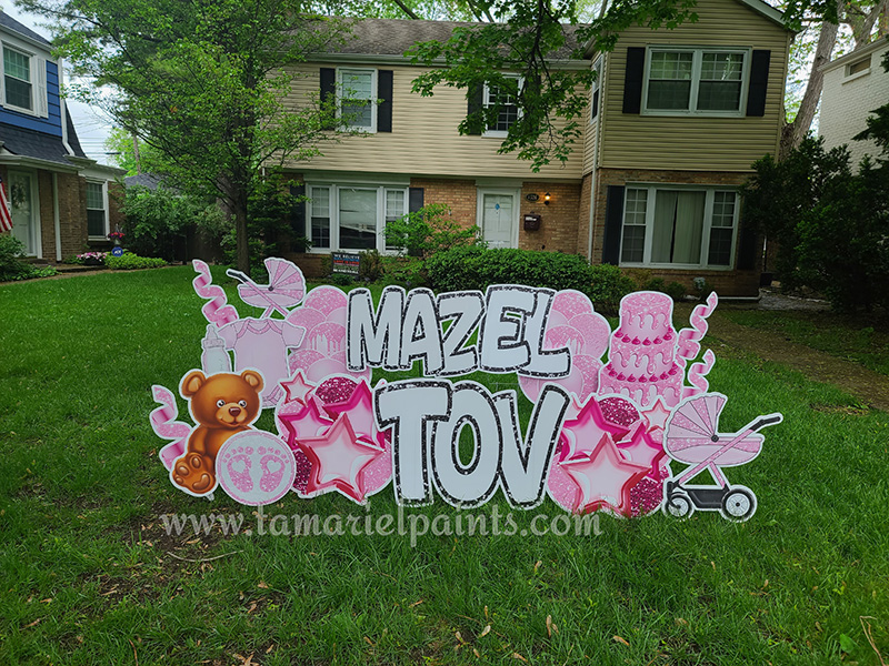 A photo of a custom made yard sign which reads Mazel Tov