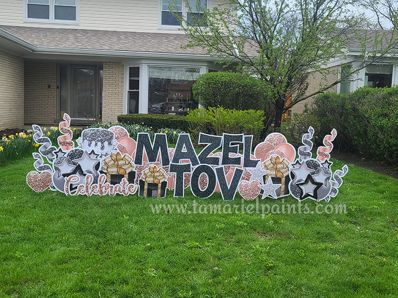 A photo of a custom made yard sign which reads Mazel Tov