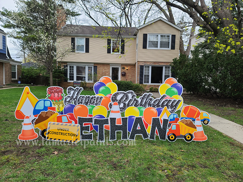 A photo of a custom made yard sign which reads Happy Birthday Ethan